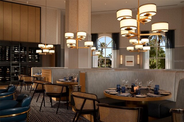 200 Ocean Crest Dr Unit 813, Palm Coast, FL 32137 - dining space with a chandelier