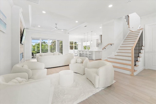 23 Ocean Ridge Blvd N, Palm Coast, FL 32137 - living area featuring ceiling fan, stairway, recessed lighting, light wood-style floors, and ornamental molding