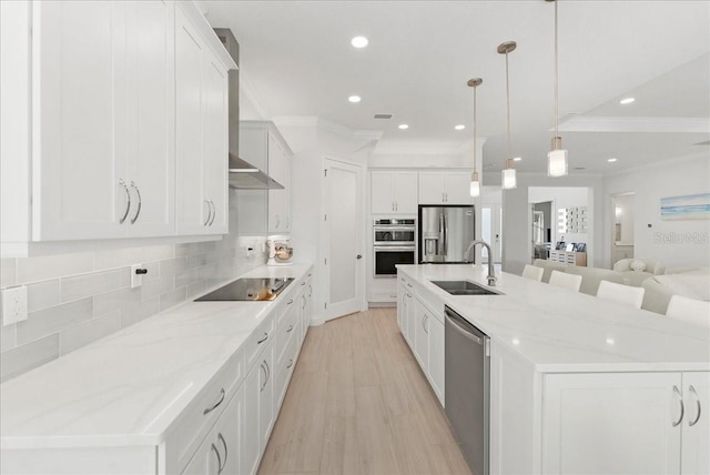 23 Ocean Ridge Blvd N, Palm Coast, FL 32137 - kitchen with stainless steel appliances, open floor plan, light wood-type flooring, decorative backsplash, and white cabinetry