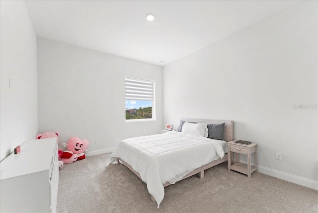 23 Ocean Ridge Blvd N, Palm Coast, FL 32137 - bedroom with light carpet and baseboards