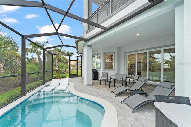 23 Ocean Ridge Blvd N, Palm Coast, FL 32137 - swimming pool featuring a patio area and a lanai