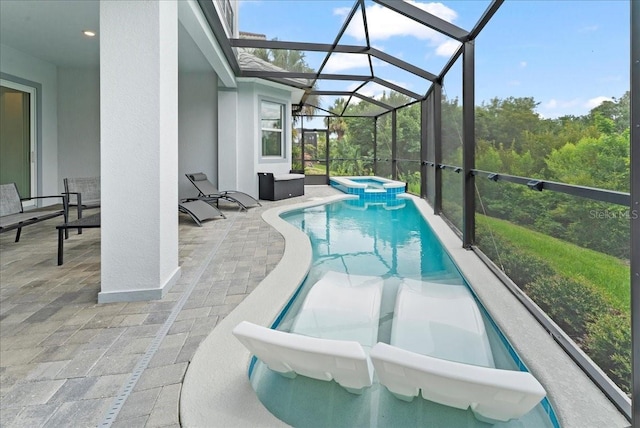 23 Ocean Ridge Blvd N, Palm Coast, FL 32137 - view of pool featuring a patio, a pool with connected hot tub, and a lanai