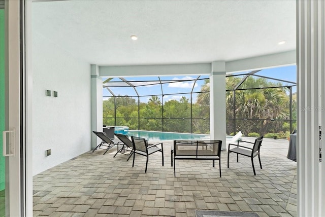23 Ocean Ridge Blvd N, Palm Coast, FL 32137 - view of patio featuring an outdoor pool and glass enclosure