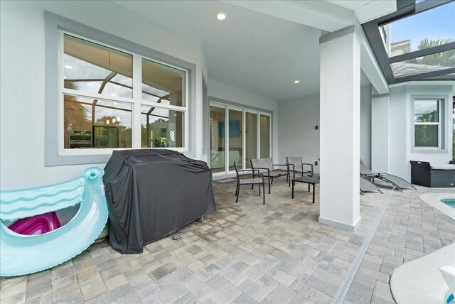 23 Ocean Ridge Blvd N, Palm Coast, FL 32137 - view of patio with area for grilling and outdoor lounge area