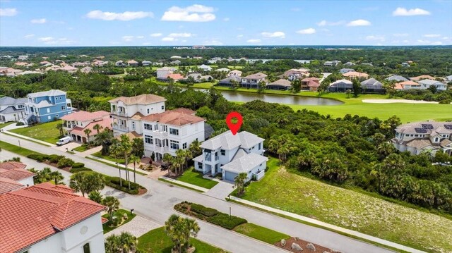 23 Ocean Ridge Blvd N, Palm Coast, FL 32137 - aerial view of residential area with a nearby body of water