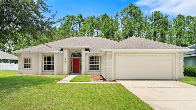 1707 Southern Belle Ln, Port Orange, FL 32128 - single story home featuring stucco siding, an attached garage, driveway, and roof with shingles