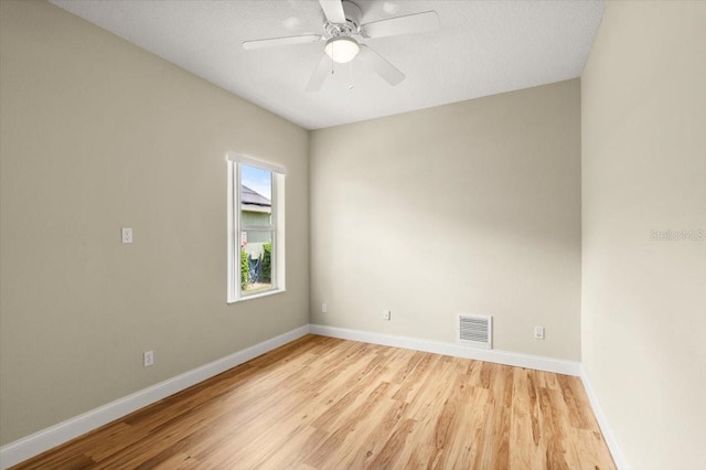 1707 Southern Belle Ln, Port Orange, FL 32128 - spare room with light wood-style flooring and ceiling fan