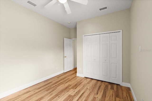 1707 Southern Belle Ln, Port Orange, FL 32128 - unfurnished bedroom with wood finished floors, a closet, and ceiling fan