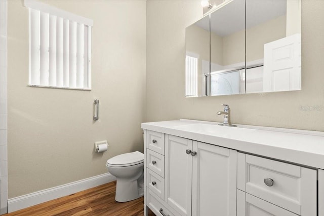 1707 Southern Belle Ln, Port Orange, FL 32128 - full bathroom with vanity, a shower with door, and wood finished floors