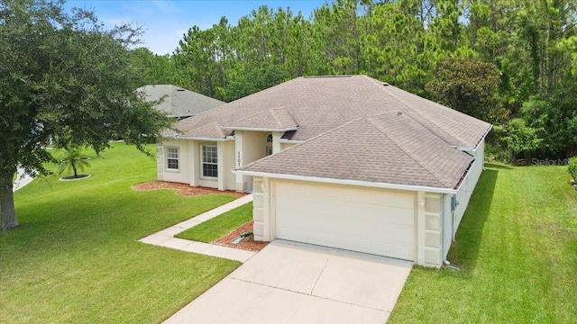 1707 Southern Belle Ln, Port Orange, FL 32128 - ranch-style house featuring an attached garage, concrete driveway, a shingled roof, and a front lawn