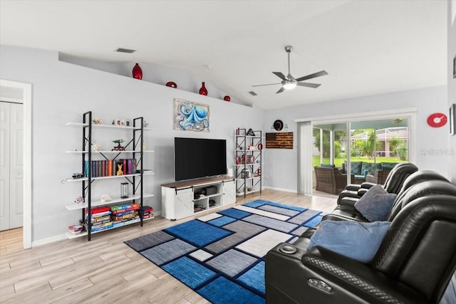 25 Round Mill Ln, Palm Coast, FL 32164 - living room with ceiling fan, vaulted ceiling, and wood finished floors