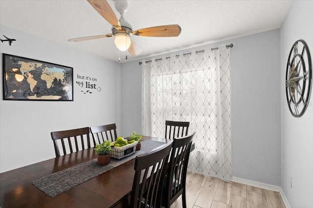 25 Round Mill Ln, Palm Coast, FL 32164 - dining space featuring a ceiling fan and light wood-style flooring
