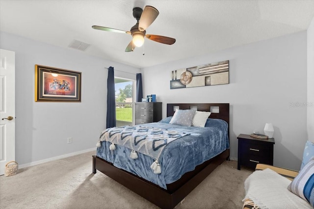 25 Round Mill Ln, Palm Coast, FL 32164 - carpeted bedroom featuring baseboards and a ceiling fan