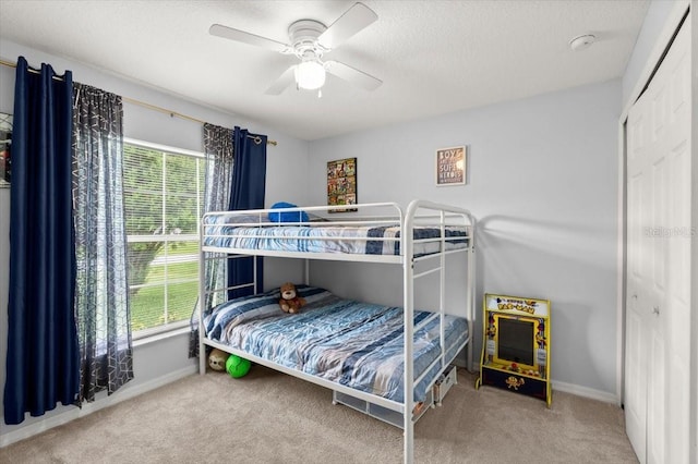 25 Round Mill Ln, Palm Coast, FL 32164 - carpeted bedroom featuring ceiling fan and a closet