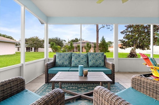 25 Round Mill Ln, Palm Coast, FL 32164 - sunroom featuring an outdoor living space and ceiling fan