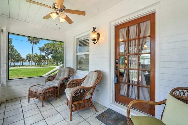 1146 Riverside Dr, Daytona Beach, FL 32117 - sunroom / solarium with ceiling fan and a water view
