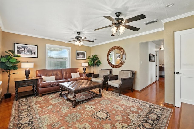 1146 Riverside Dr, Daytona Beach, FL 32117 - living area with ceiling fan, wood finished floors, and ornamental molding