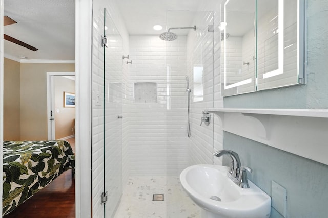 1146 Riverside Dr, Daytona Beach, FL 32117 - bathroom featuring a shower stall and ornamental molding