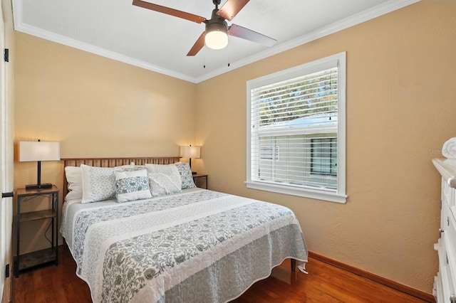 1146 Riverside Dr, Daytona Beach, FL 32117 - bedroom with wood finished floors, crown molding, and a ceiling fan