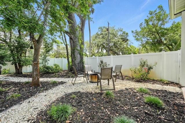 1146 Riverside Dr, Daytona Beach, FL 32117 - fenced backyard featuring a patio