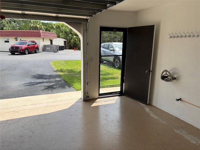 32 S Ocean Palm Villa Dr S Unit 320, Flagler Beach, FL 32136 - foyer entrance with plenty of natural light and finished concrete floors