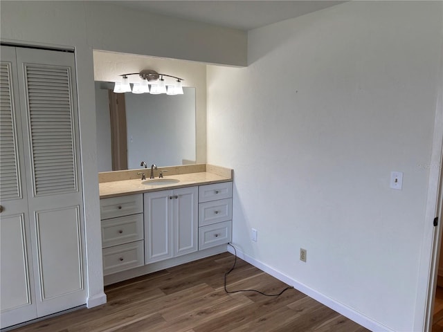 32 S Ocean Palm Villa Dr S Unit 320, Flagler Beach, FL 32136 - bathroom with vanity, wood finished floors, and a closet