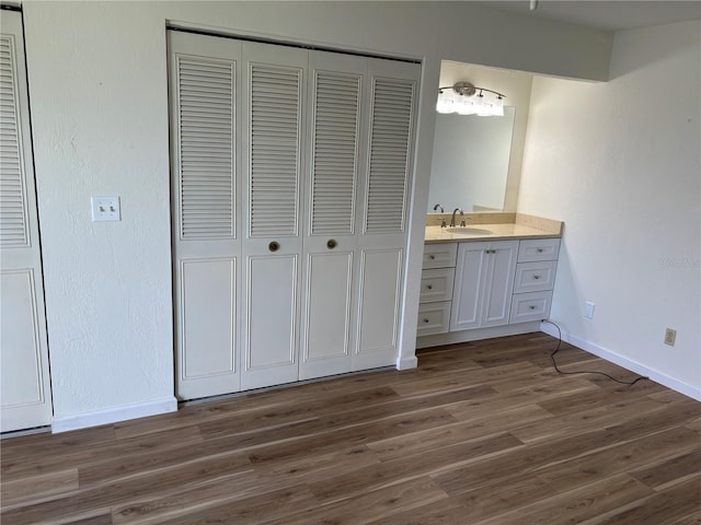 32 S Ocean Palm Villa Dr S Unit 320, Flagler Beach, FL 32136 - bathroom featuring a closet, vanity, and wood finished floors