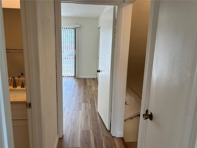 32 S Ocean Palm Villa Dr S Unit 320, Flagler Beach, FL 32136 - hall with wood finished floors and baseboards