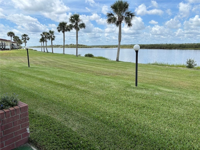 32 S Ocean Palm Villa Dr S Unit 320, Flagler Beach, FL 32136 - view of green lawn with a water view