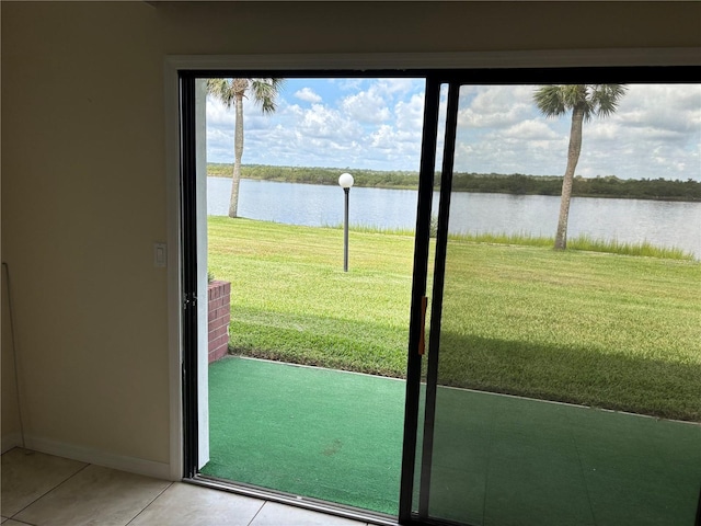32 S Ocean Palm Villa Dr S Unit 320, Flagler Beach, FL 32136 - entryway with a water view and light tile patterned flooring
