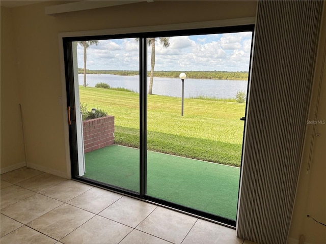 32 S Ocean Palm Villa Dr S Unit 320, Flagler Beach, FL 32136 - entryway featuring a water view and light tile patterned flooring