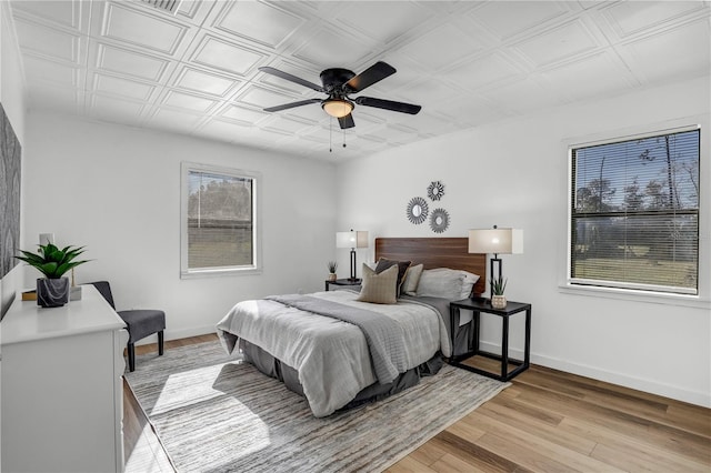 54221 Cravey Rd, Callahan, FL 32011 - bedroom featuring an ornate ceiling, light wood-style flooring, and ceiling fan