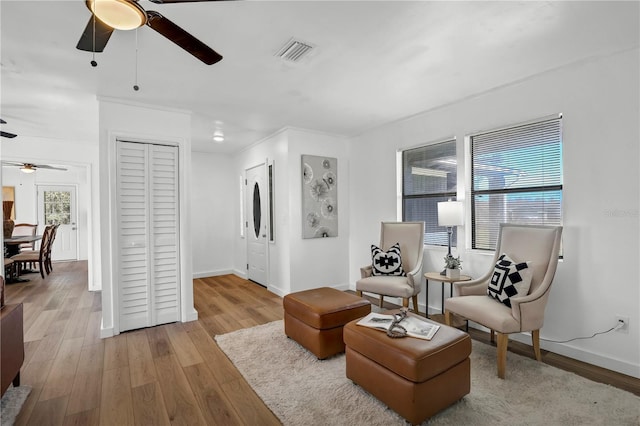 54221 Cravey Rd, Callahan, FL 32011 - living area featuring a ceiling fan and wood finished floors