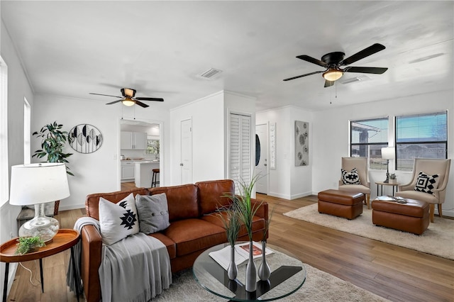 54221 Cravey Rd, Callahan, FL 32011 - living area featuring ceiling fan and light wood finished floors