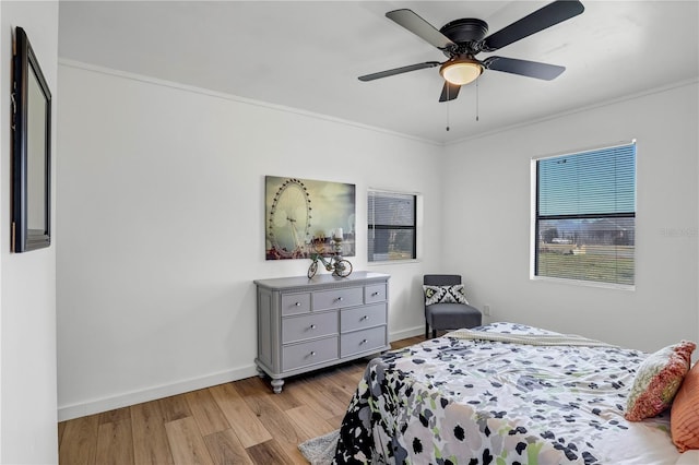 54221 Cravey Rd, Callahan, FL 32011 - bedroom featuring wood finished floors, crown molding, and a ceiling fan