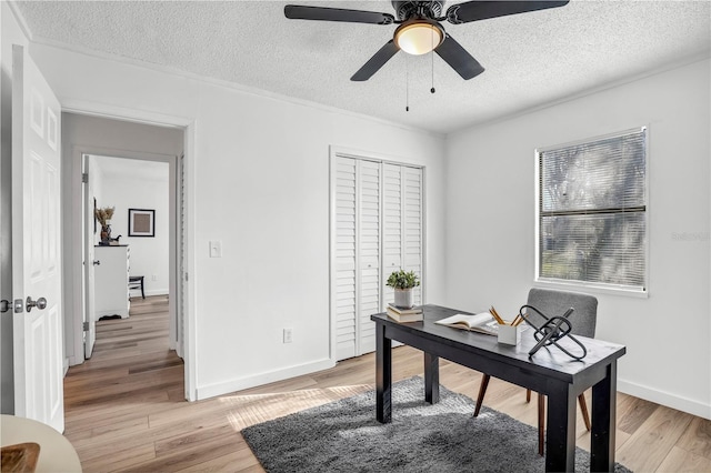 54221 Cravey Rd, Callahan, FL 32011 - office area with light wood-style floors, ceiling fan, and a textured ceiling