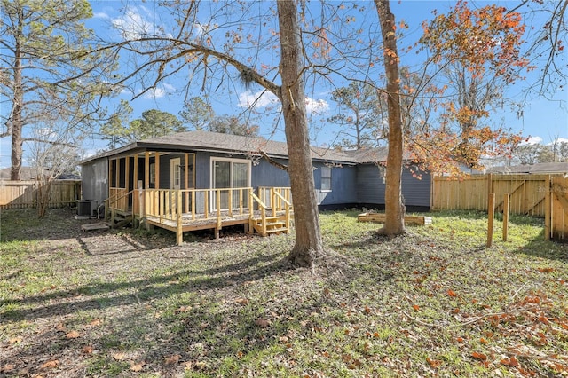 54221 Cravey Rd, Callahan, FL 32011 - rear view of property with a deck and a fenced backyard