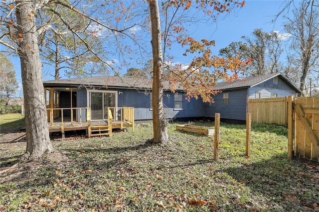 54221 Cravey Rd, Callahan, FL 32011 - rear view of property with a deck and roof with shingles