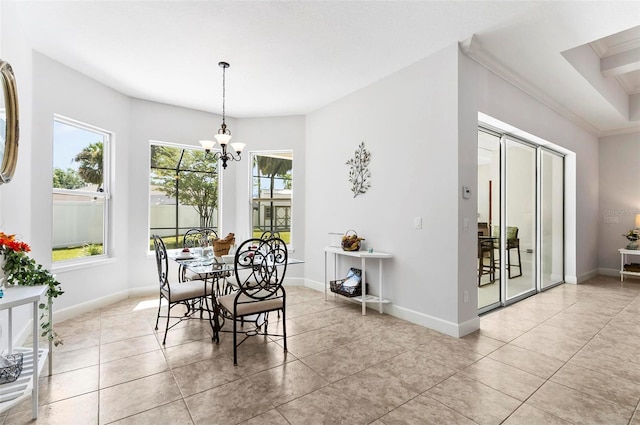 15 Long Pl, Palm Coast, FL 32137 - dining area with a chandelier, light tile patterned flooring, and ornamental molding