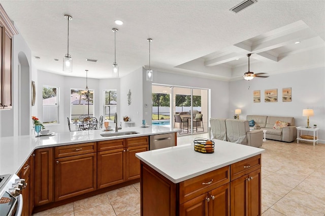 15 Long Pl, Palm Coast, FL 32137 - kitchen featuring ceiling fan, light tile patterned flooring, light countertops, beam ceiling, and dishwasher
