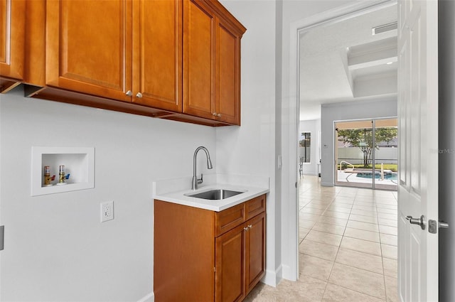 15 Long Pl, Palm Coast, FL 32137 - laundry area featuring hookup for a washing machine, cabinet space, and light tile patterned flooring