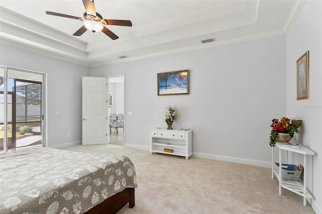 15 Long Pl, Palm Coast, FL 32137 - carpeted bedroom with a raised ceiling, access to exterior, crown molding, and ceiling fan