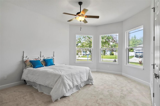 15 Long Pl, Palm Coast, FL 32137 - bedroom featuring multiple windows, carpet floors, and ceiling fan