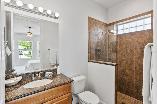 15 Long Pl, Palm Coast, FL 32137 - ensuite bathroom with vanity, walk in shower, and ceiling fan