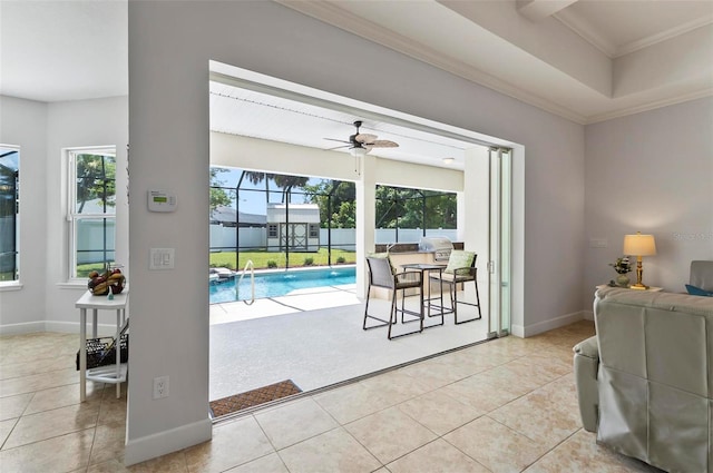 15 Long Pl, Palm Coast, FL 32137 - doorway to outside featuring tile patterned floors, ornamental molding, and ceiling fan