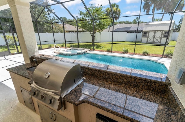 15 Long Pl, Palm Coast, FL 32137 - view of swimming pool featuring area for grilling, a patio area, a fenced backyard, glass enclosure, and a storage shed