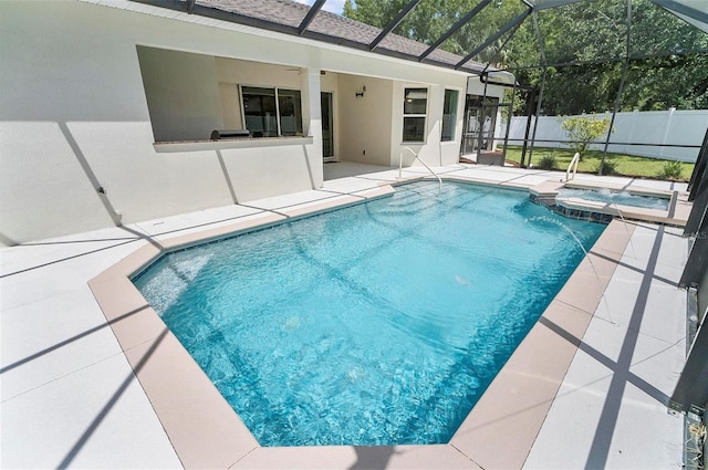 15 Long Pl, Palm Coast, FL 32137 - view of swimming pool with a patio area, a pool with connected hot tub, and glass enclosure