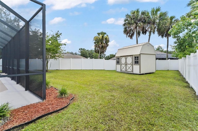 15 Long Pl, Palm Coast, FL 32137 - fenced backyard featuring a storage shed and glass enclosure