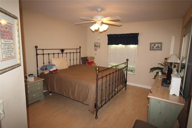 07 Gaston Pl, Palm Coast, FL 32164 - bedroom with light wood-type flooring and a ceiling fan