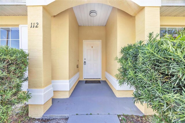 112 Ulaturn Trl, Palm Coast, FL 32164 - entrance to property with stucco siding
